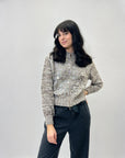 Cardigan con paillettes e zip