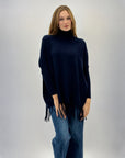 Pullover dolcevita con frange