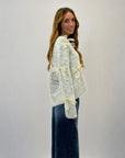 Maglione con fiocchi