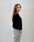 Pantaloni spigati con vita elasticizzata