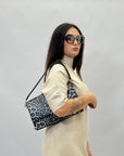 Borsa pochette animalier