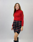 Gonna tartan con drappeggio