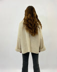Maglione con bottoni over