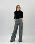 Maglia costine con scollo particolare