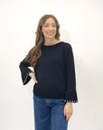 Maglia con perle sulle maniche