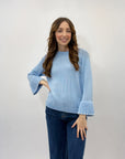 Maglia con perle sulle maniche