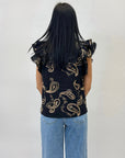 Blusa in cotone con maniche a volant con ricami