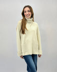 Maglione dolcevita ampio con tasche
