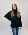 Maglione dolcevita ampio con tasche
