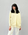 Maglione ampio dolcevita con frange