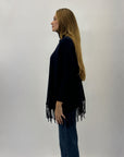 Pullover dolcevita con frange
