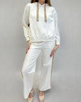 Pantaloni tuta con paillettes laterali