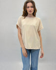 Maglia con strass e sul retro fiocco