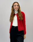 Pullover con chiusura a spilla con perla