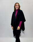 Poncho morbido tinta unita con frange