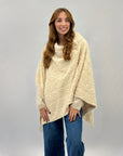 Poncho morbido peluche