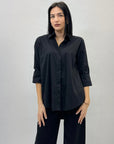 Camicia tinta unita con maniche lunghe