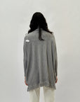 Maglione dolcevita ampio con frange