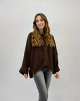 Maglione con bottoni over