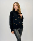 Pullover fiocchietti ricamati
