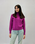 Maglione dolcevita con tre intrecci