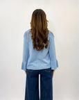 Maglia con perle sulle maniche