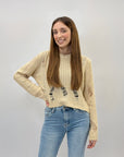Pullover crop con strappi