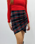Gonna tartan con drappeggio