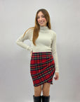 Gonna tartan con drappeggio
