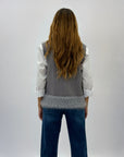 Maglia gilet morbida con piume