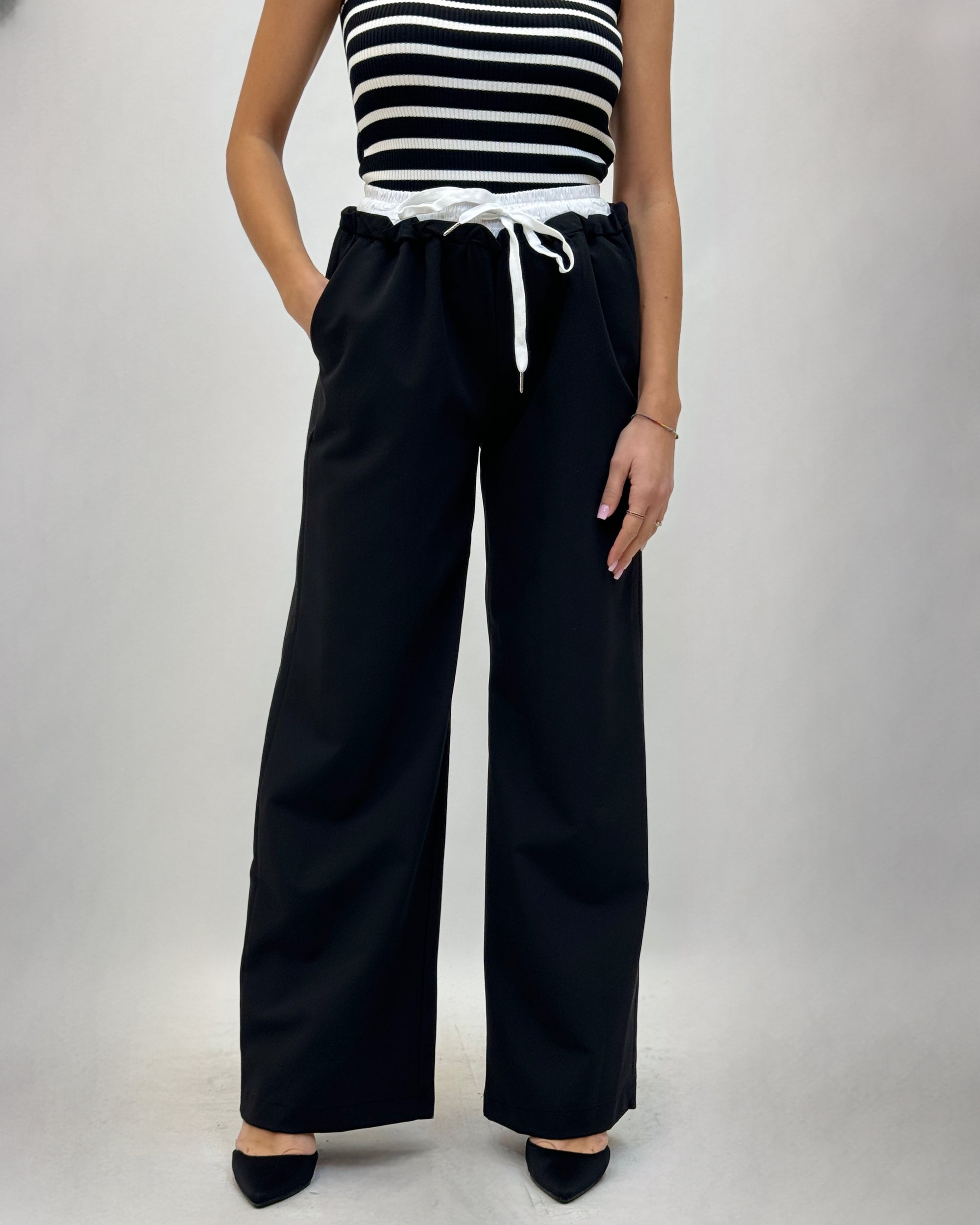 Pantaloni gamba larga con elastico