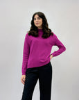 Pullover tinta unita con bottoni laterali