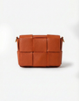 Mini bag intrecciata in vera pelle dal design moderno