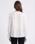 Camicia elegante con pizzo e scollo a V