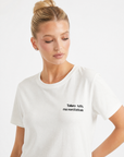 T-shirt bianca con scritta “Tollero tutto”