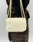 Borsa in peluche e tracolla