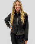 Completo donna con giacca zip e pantaloni
