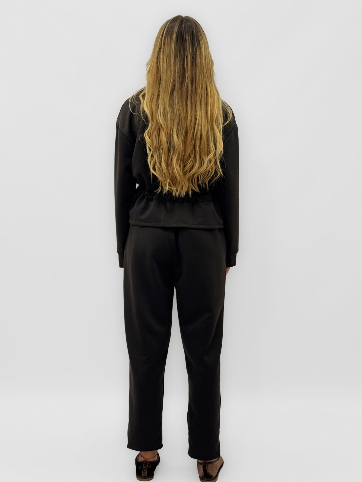 Completo donna con giacca zip e pantaloni