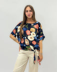 Maglia con fantasia e nodo