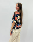 Maglia con fantasia e nodo