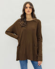 Maglione lungo con tasche frontali