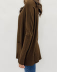 Maglione lungo con tasche frontali