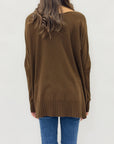 Maglione lungo con tasche frontali