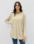 Maglione lungo con tasche frontali
