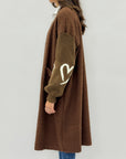 Cardigan lungo in teddy e maglia