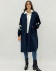 Cardigan lungo in teddy e maglia