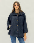 Giacca in lana bouclé con bottoni gioiello