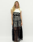 Abito lungo in pizzo trasparente effetto layering elegante