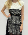 Abito lungo in pizzo trasparente effetto layering elegante