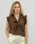 Blusa con fiocco e volant elegante e super femminile
